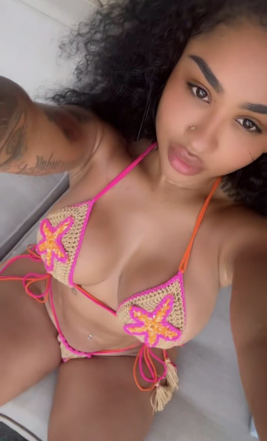 ari fletcher tits busting out bikinis