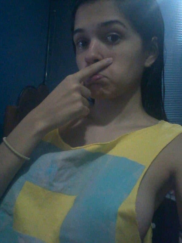 Brunette slut fake tits pretty smile