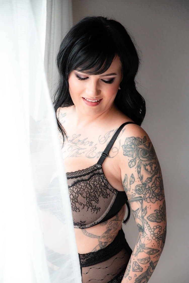 Tatted busty black hair beauty boudoir