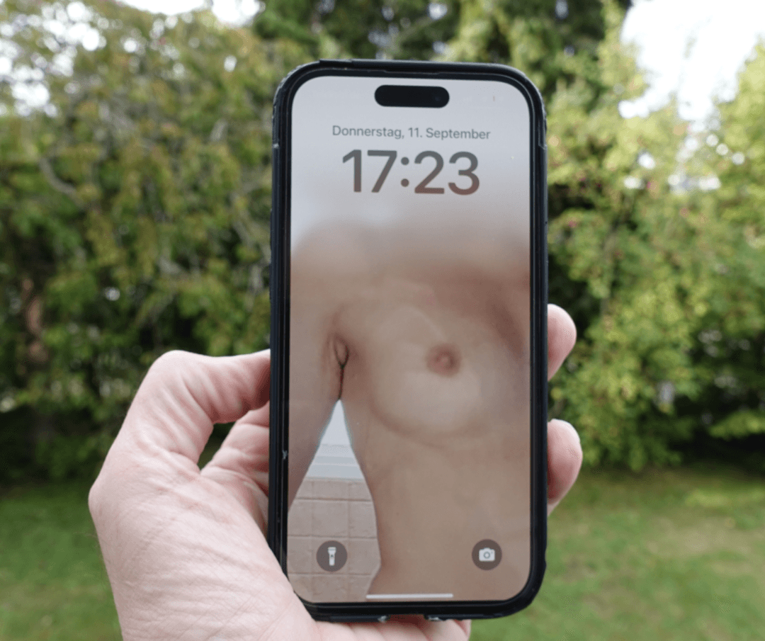 Stranger using my naked wife as his phone wallpaper in public