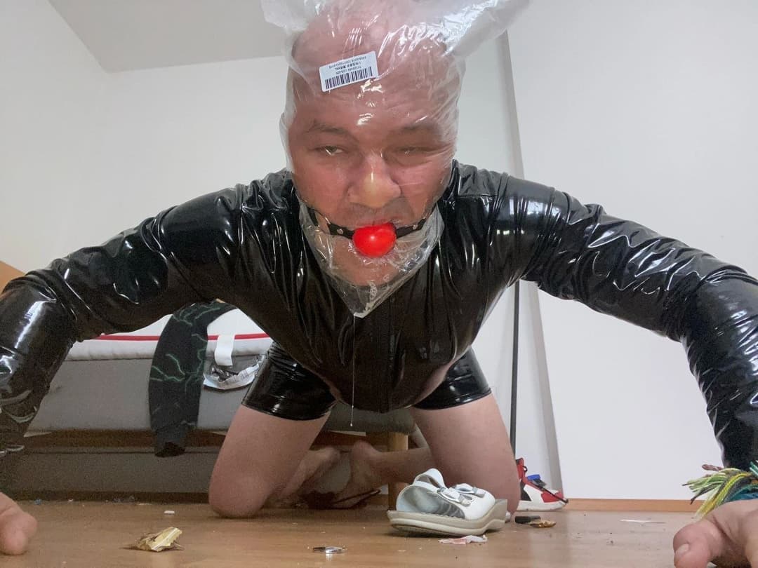 PigSlaveAndy in Latex Bondage
