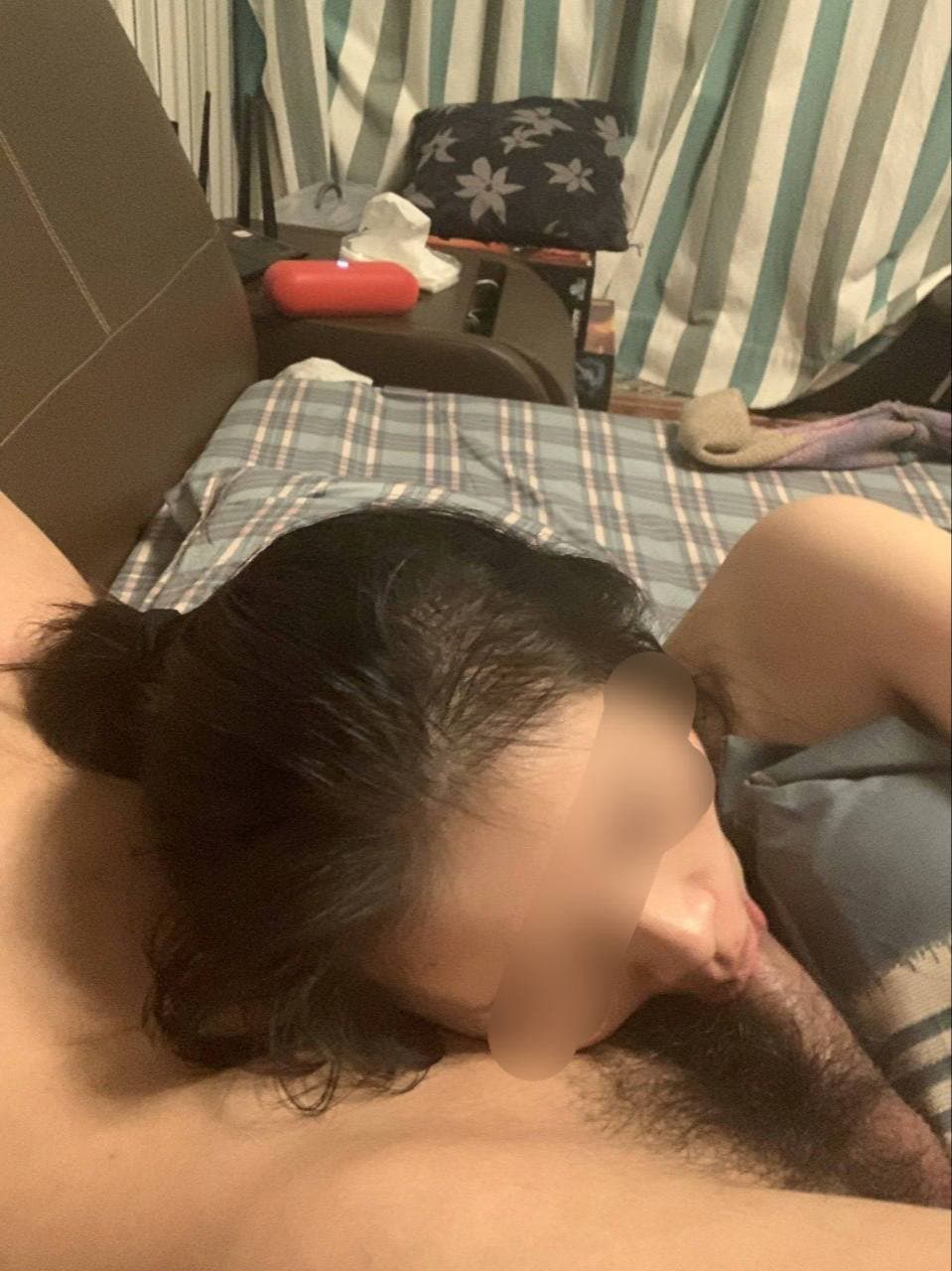 Click to view full size Girl with glasses lying down watching a movie My boyfriend gives me a blowjob.