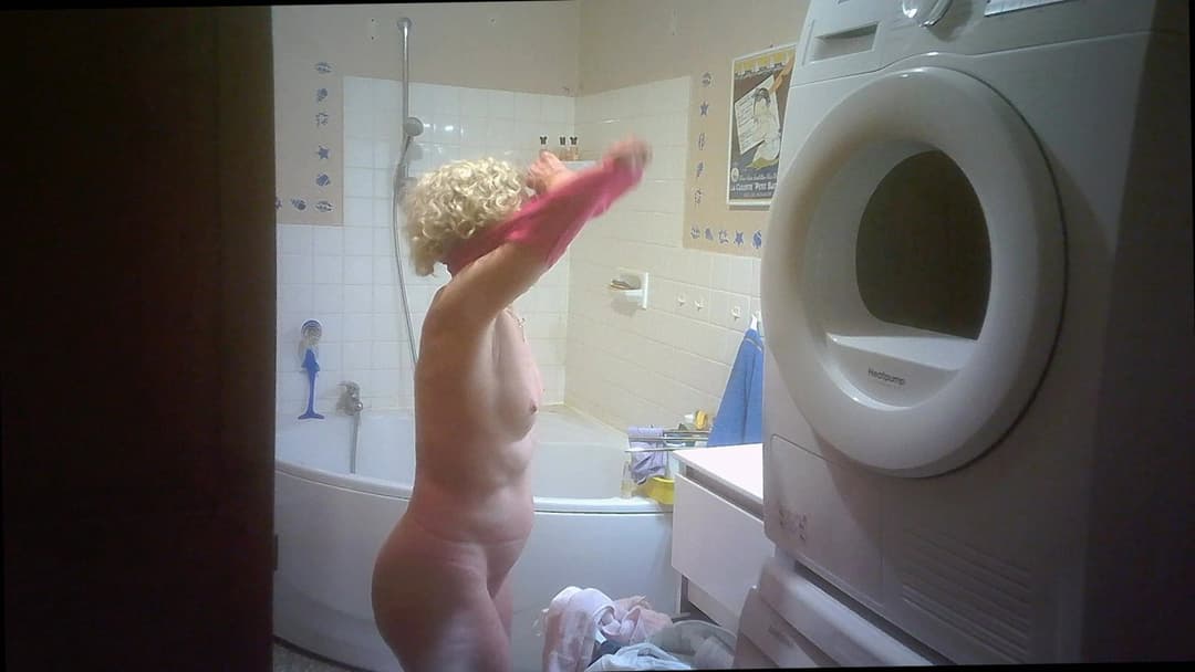 Two hidden cams for nurse Solange braless