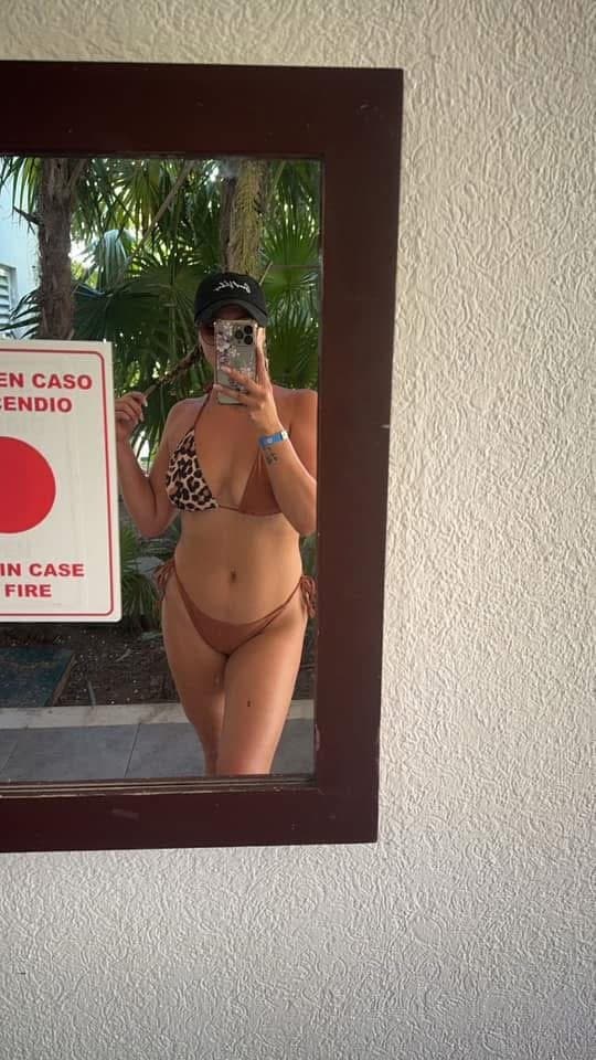 Slender with big tits in a bikini