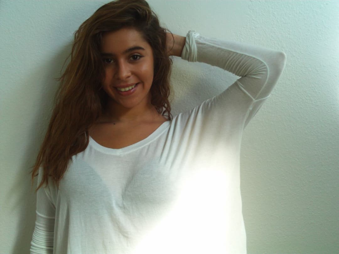 lovely latina with brown hair and eyes