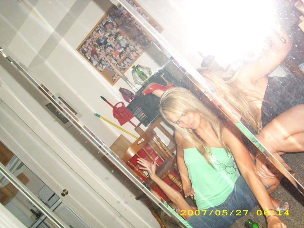 Sorority girls pre-game drink in the dorm room