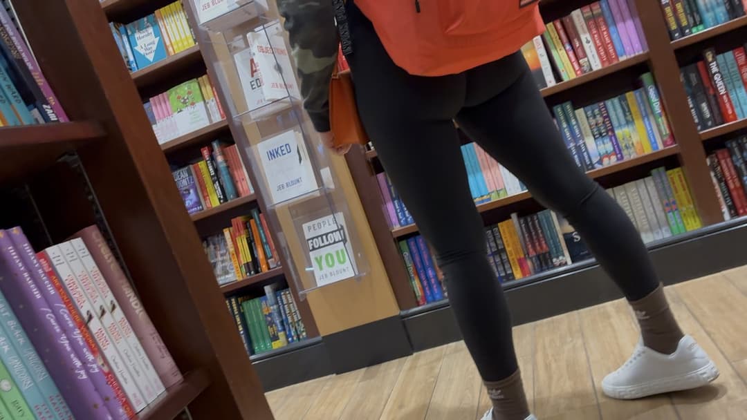 Black leggings ass looking for books