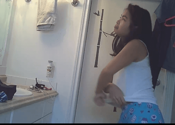 Click to view full size Asian teen on hidden cam in bathroom