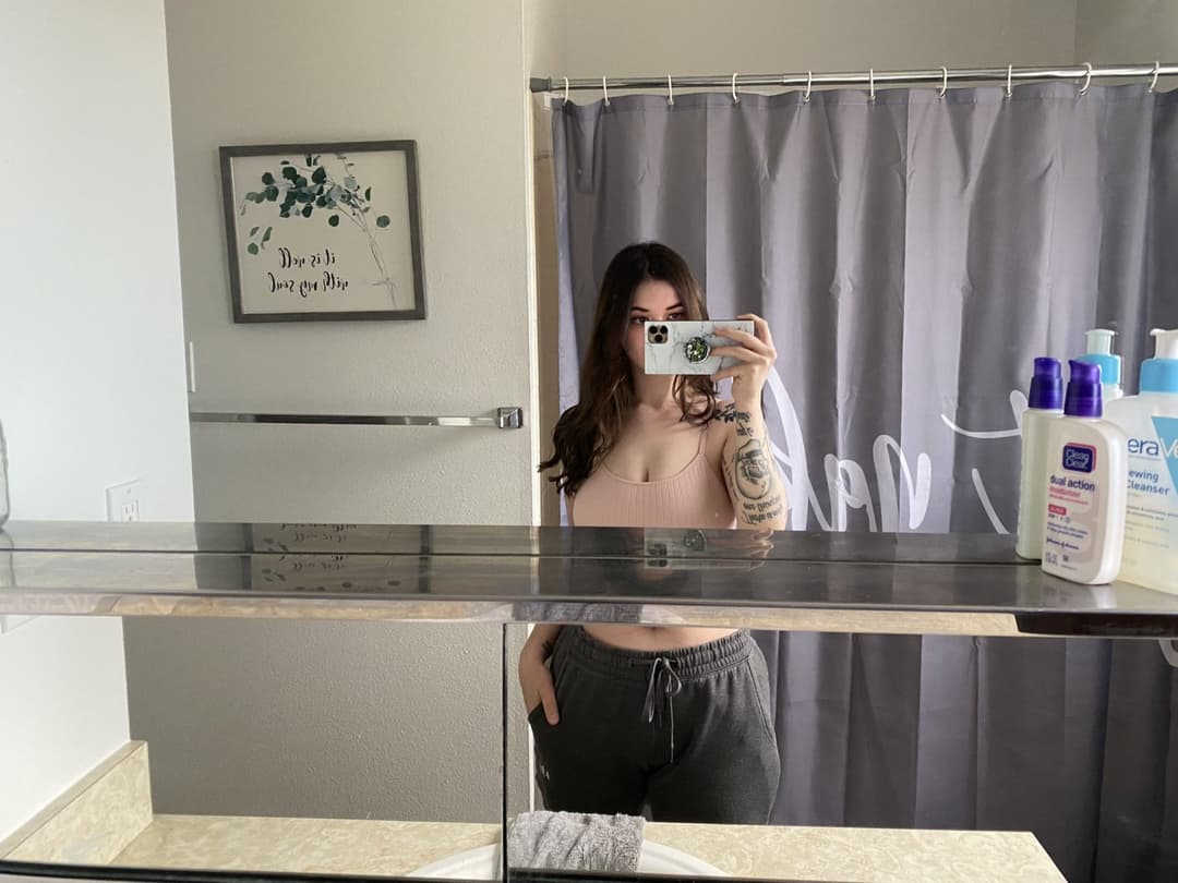 Click to view full size Hottest Milf ever? This curvy slut who loves sticking her tongue out comes damn close