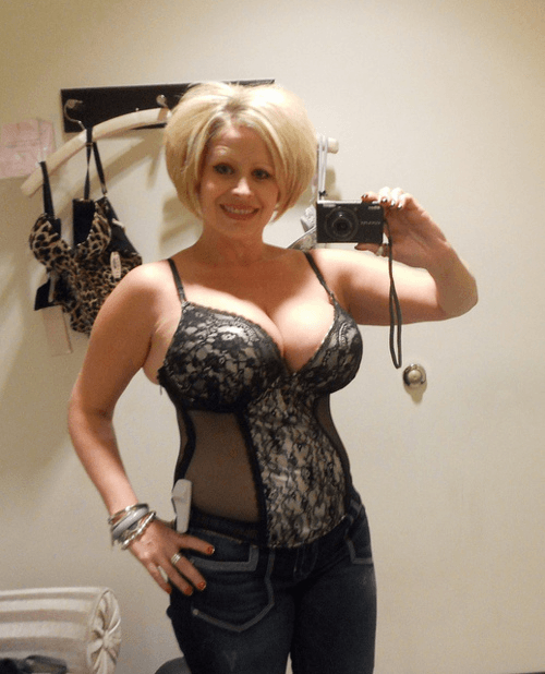 Big titty GILF loves to show off and suck black cock