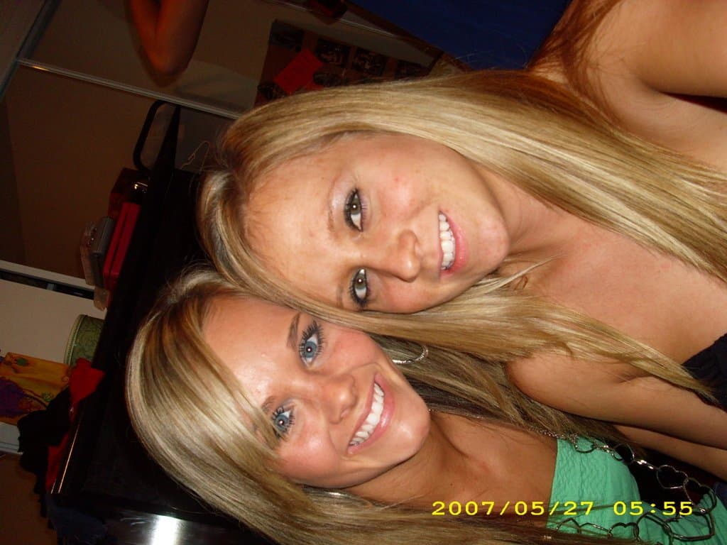 Sorority girls pre-game drink in the dorm room