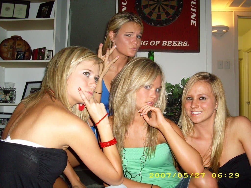 Sorority girls pre-game drink in the dorm room