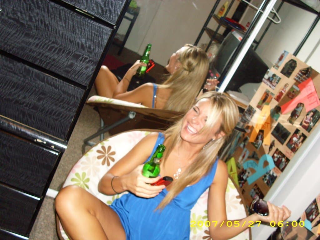 Sorority girls pre-game drink in the dorm room