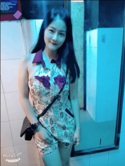 Her husband wants us to see her beautiful figure.