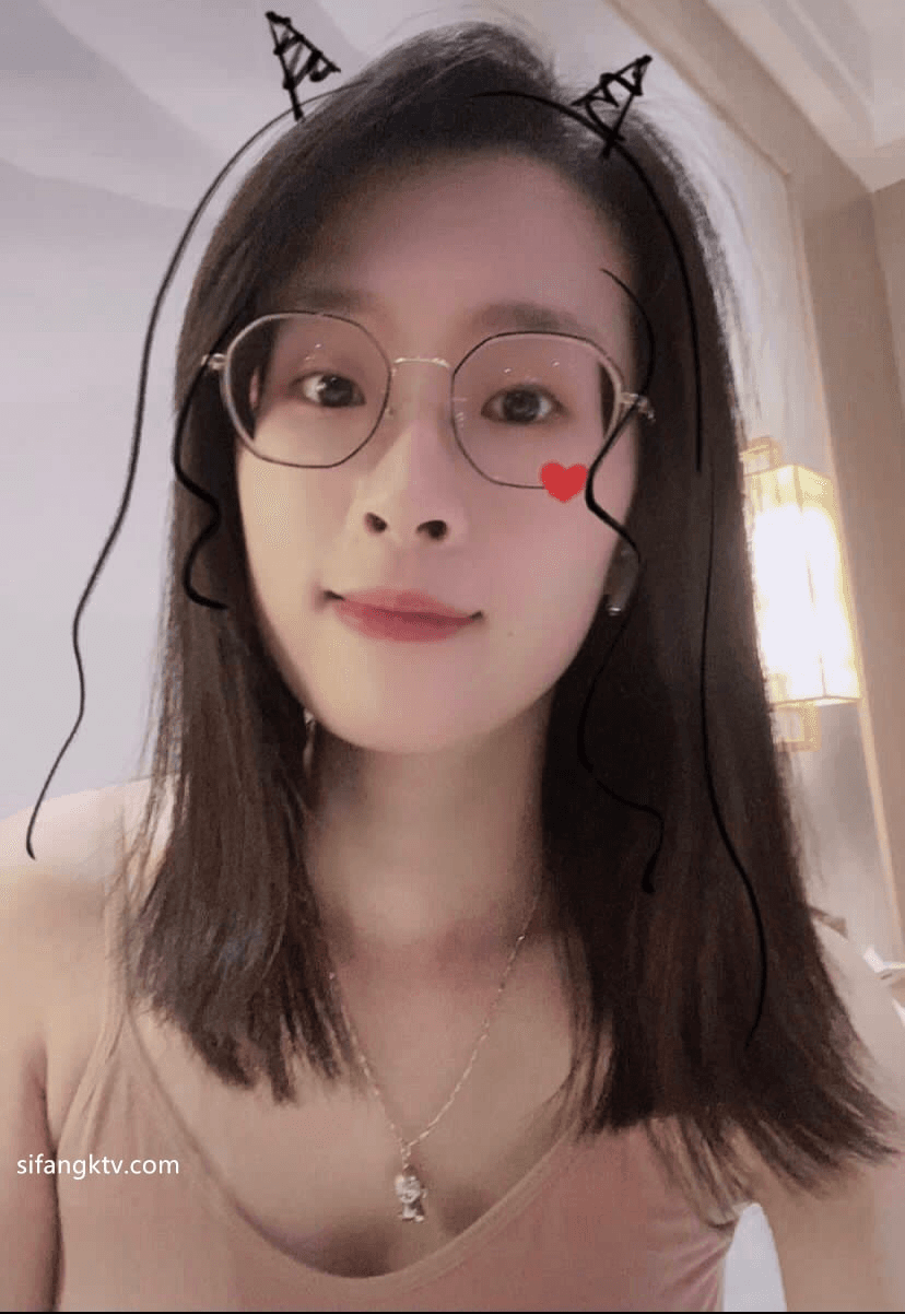 Serious looking AZN college girl behind the scene