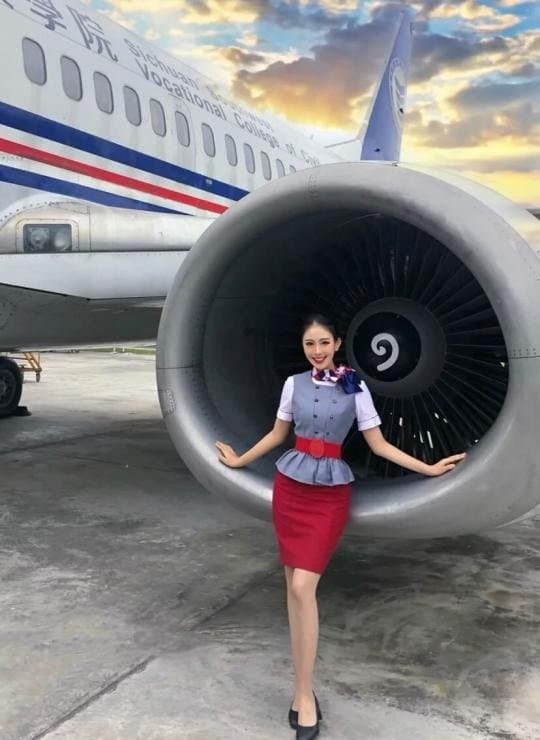 Very sexy air stewardess in uniform, and after facial.