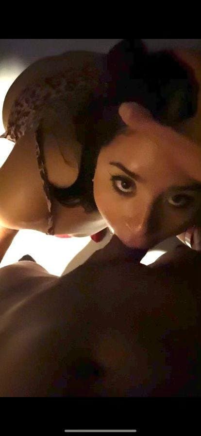 Pretty latina giving head