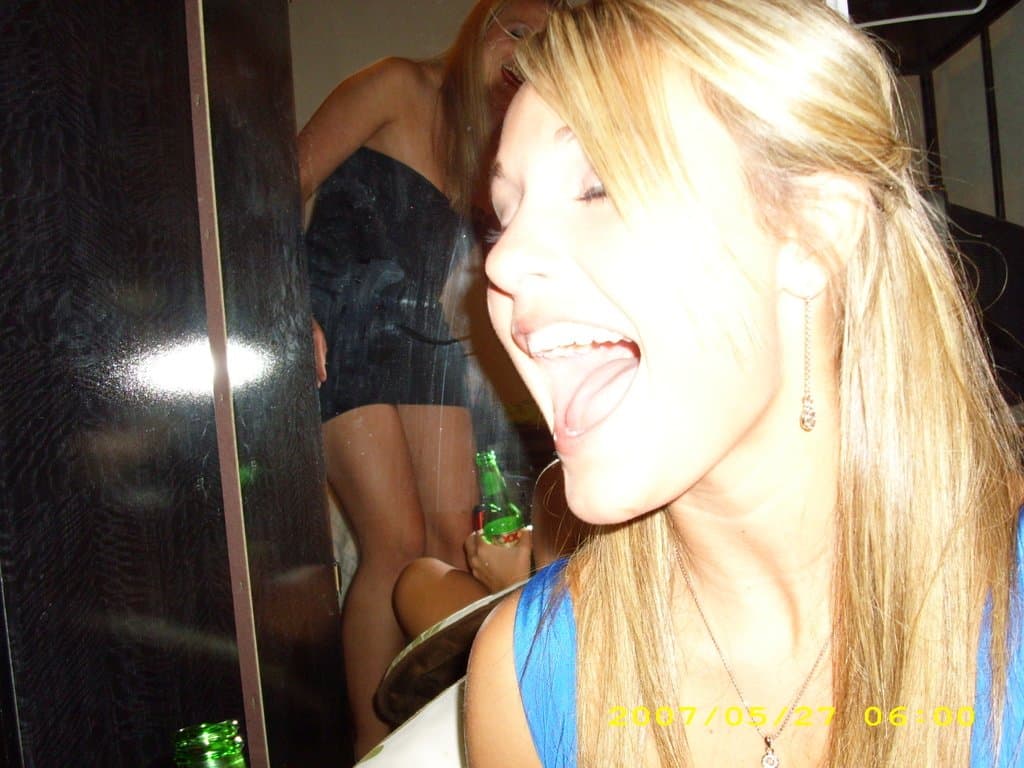 Sorority girls pre-game drink in the dorm room