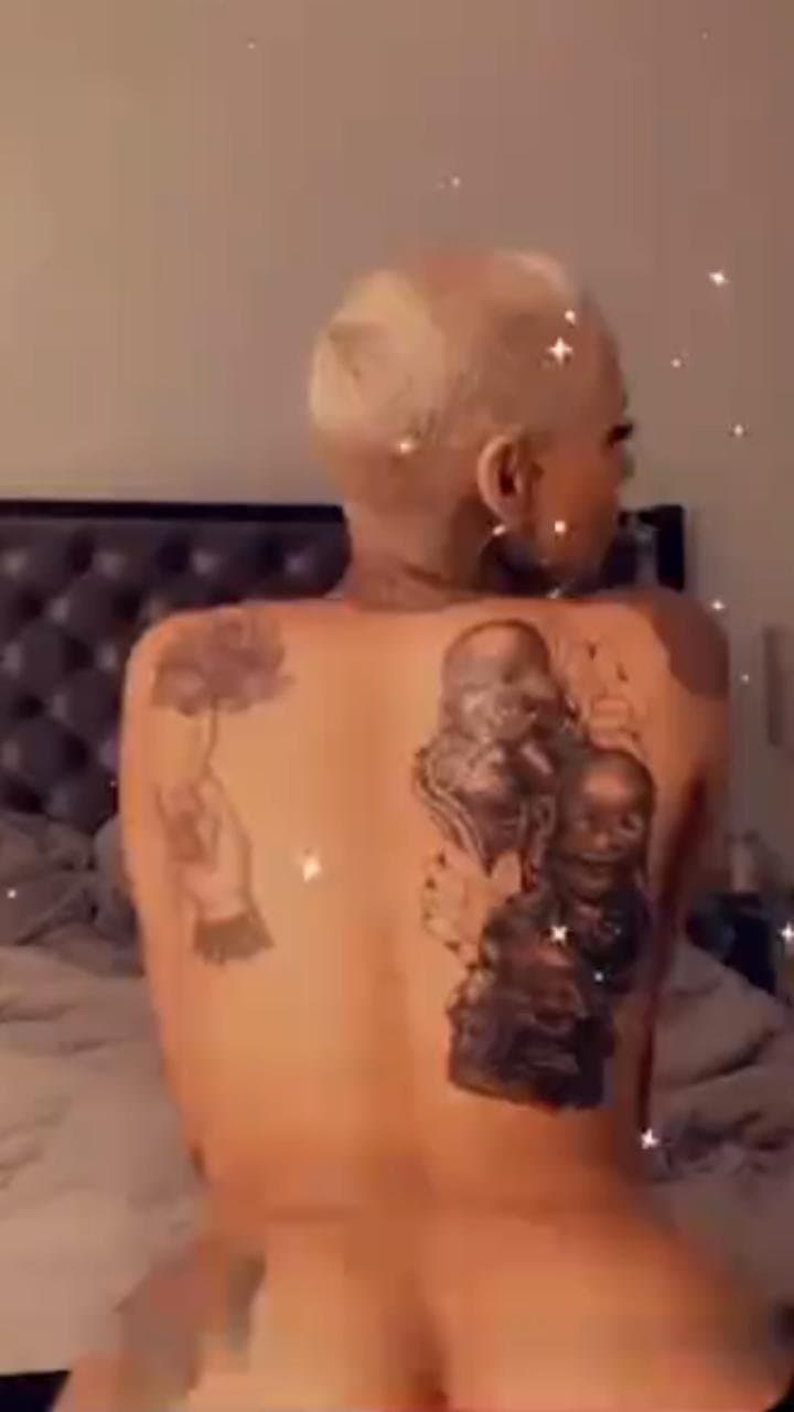 Light skin yellow bone short hair Tatted tomboy buzzcut Thotie rapper