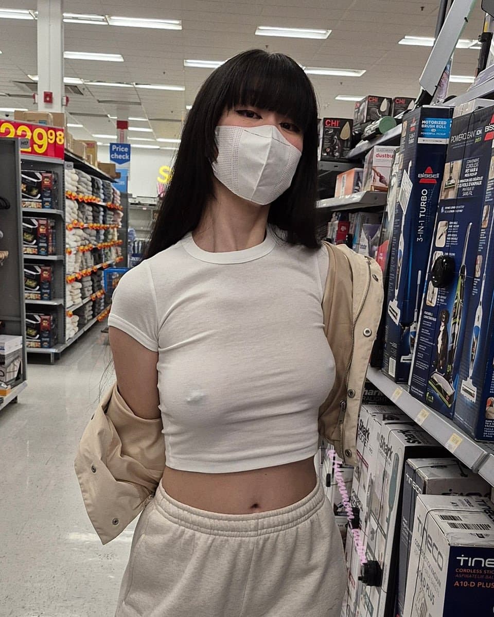 Pierced braless Asian ??