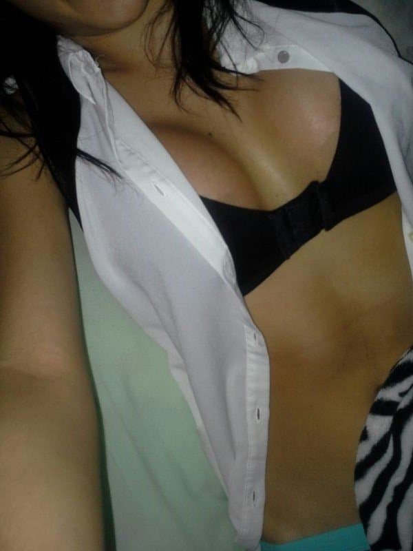 Brunette slut fake tits pretty smile