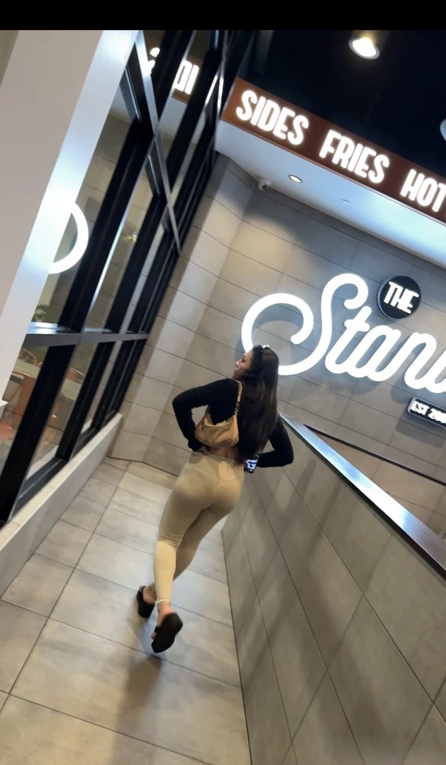 Angry thick booty Latina milf in leggings and platform flip flops