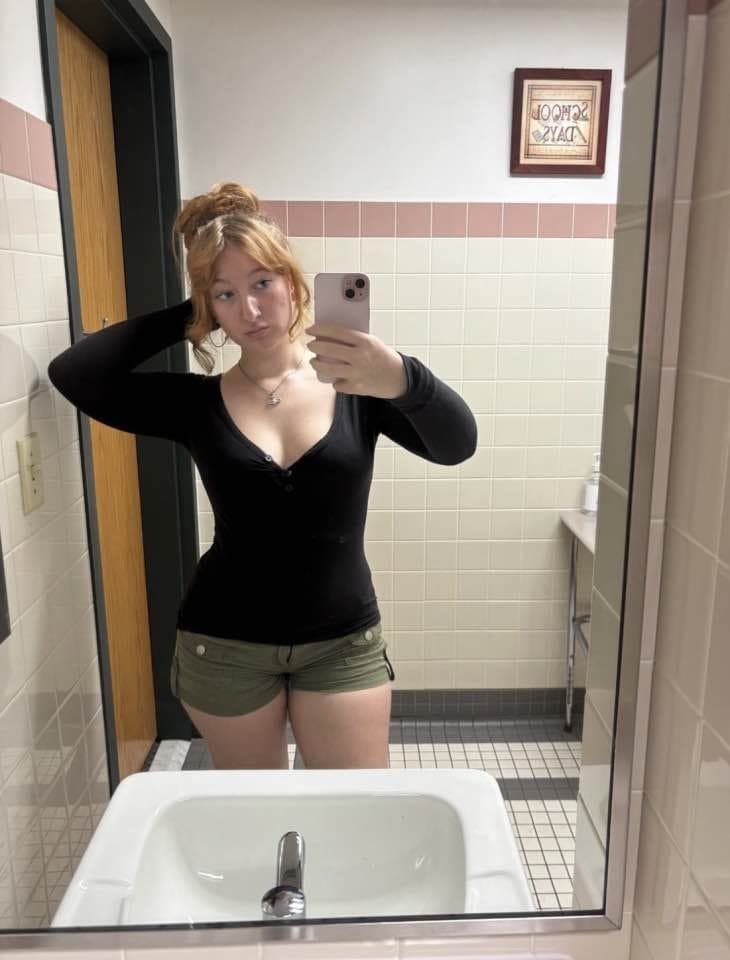 Click to view full size Slutty red head loves showing off her perfect ass