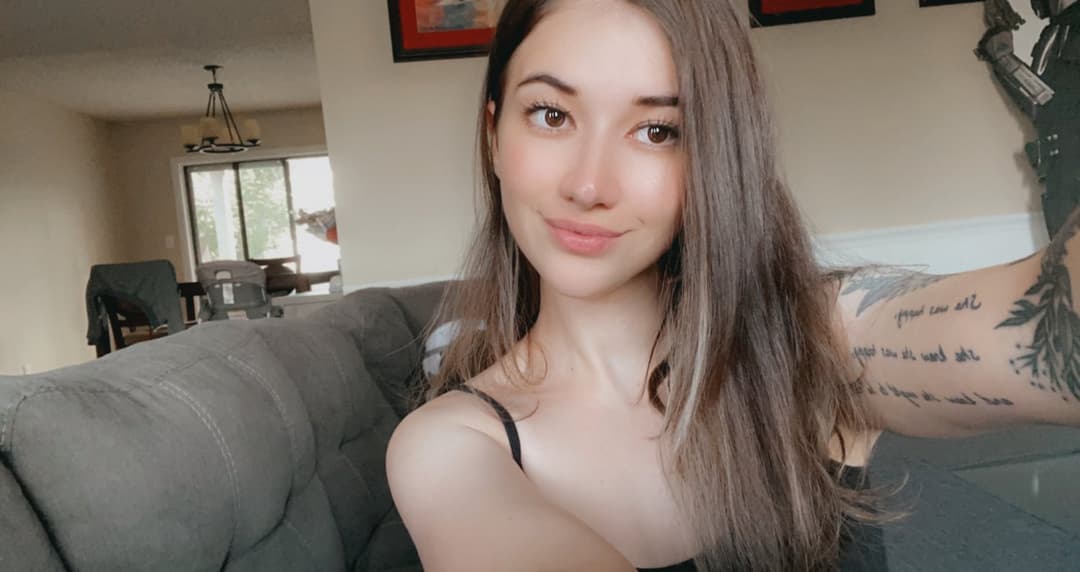 Click to view full size Hottest Milf ever? This curvy slut who loves sticking her tongue out comes damn close