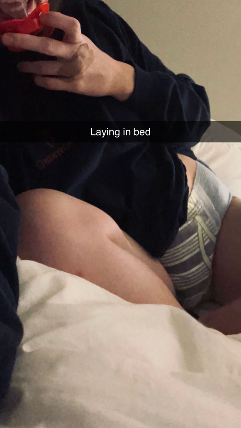 Cute tanned girl shows off her diapers and pull-ups