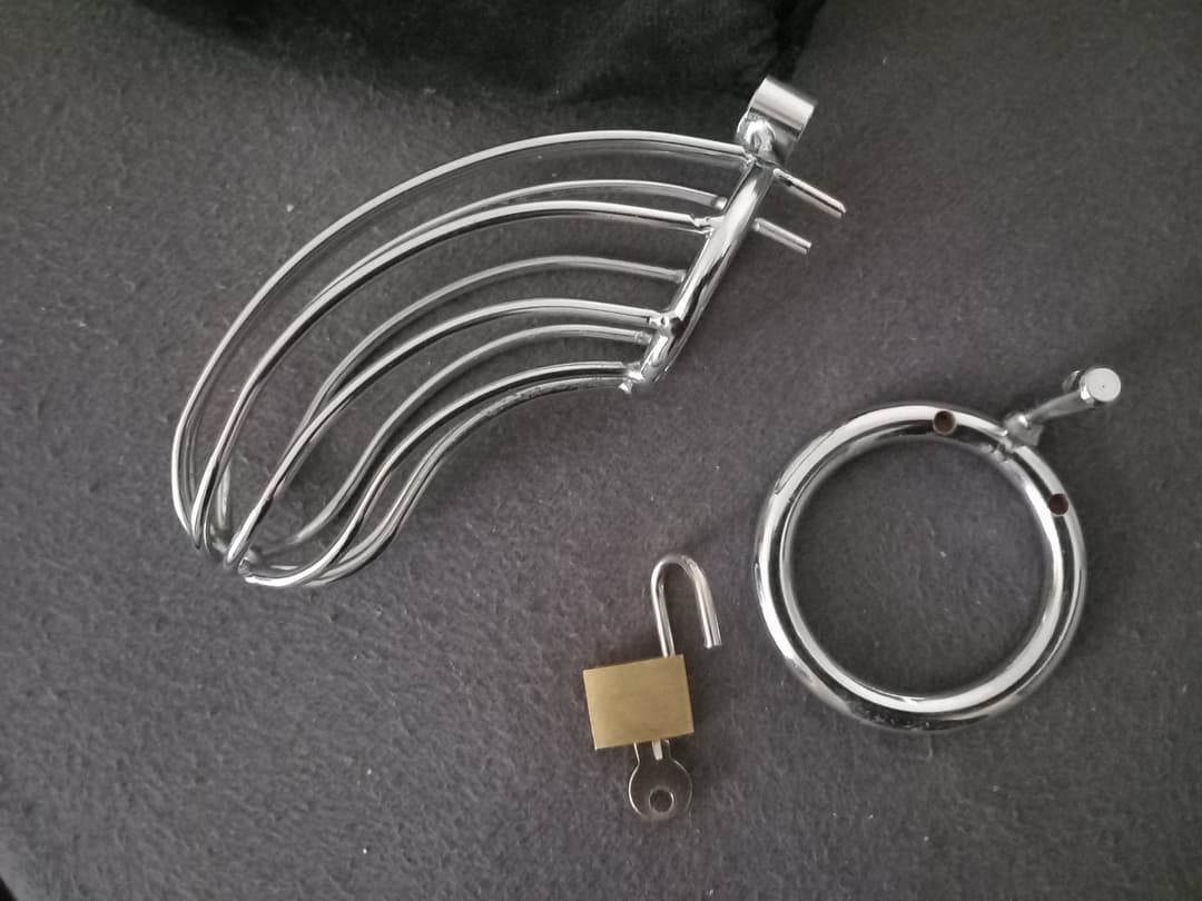 Putting on a penis cage