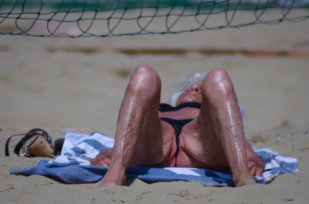 grandmother in her eighties on the beach...