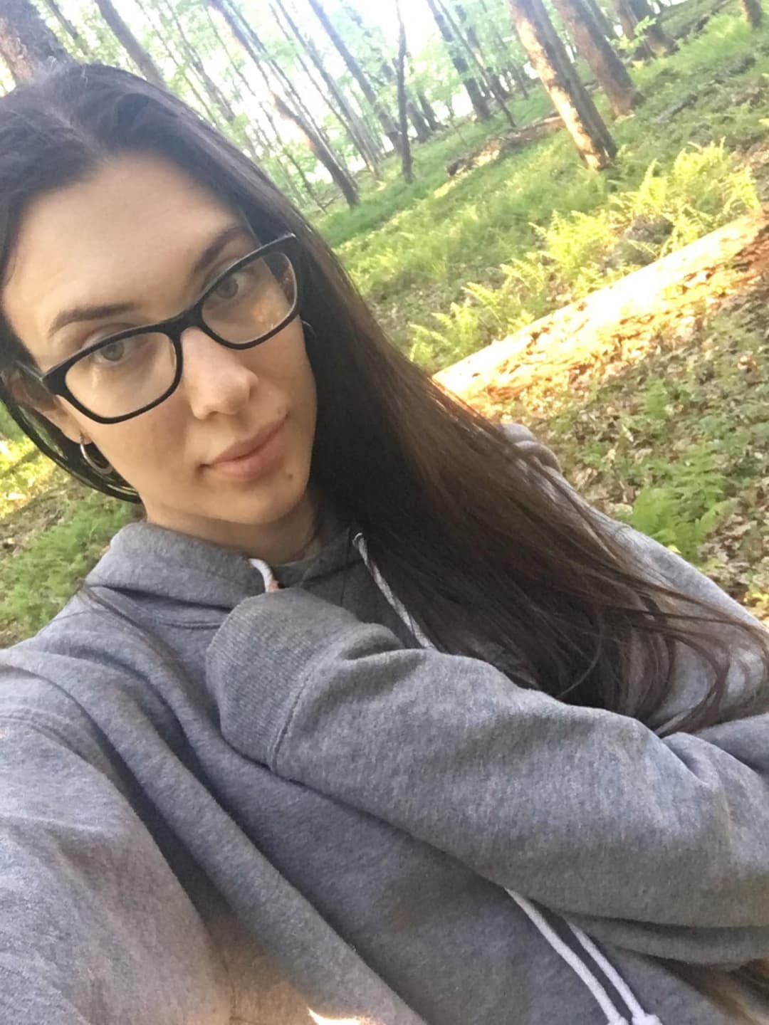 walking to the park this morning to go sunbathing . taking a short cut through the forest