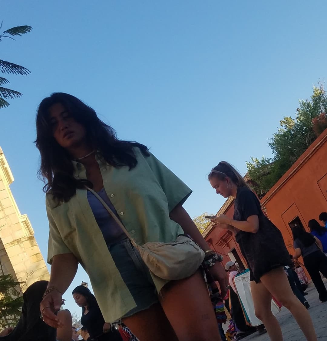 2 friends, blonde and brunette, in shorts, nice legs