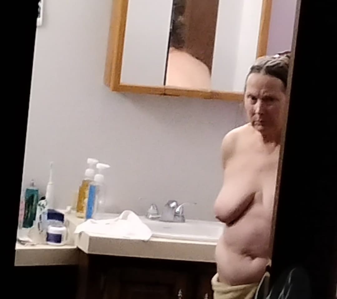Peeking at my 60-year-old mother getting dressed after taking a shower.