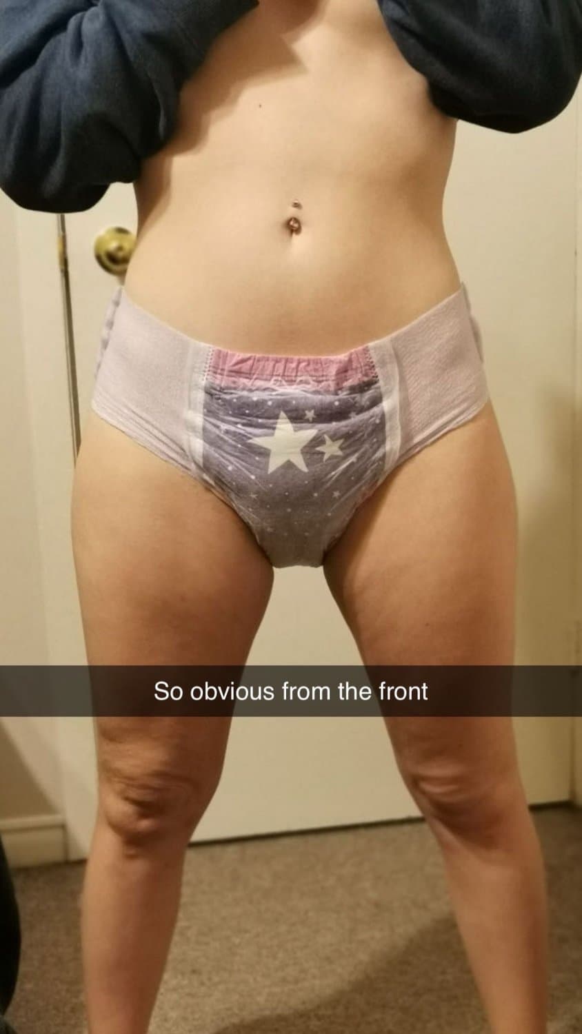 Click to view full size Cute redhead wears diapers for “anxiety”