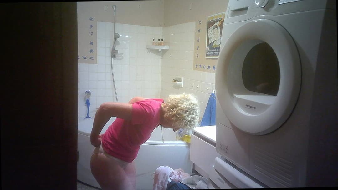 Two hidden cams for nurse Solange braless