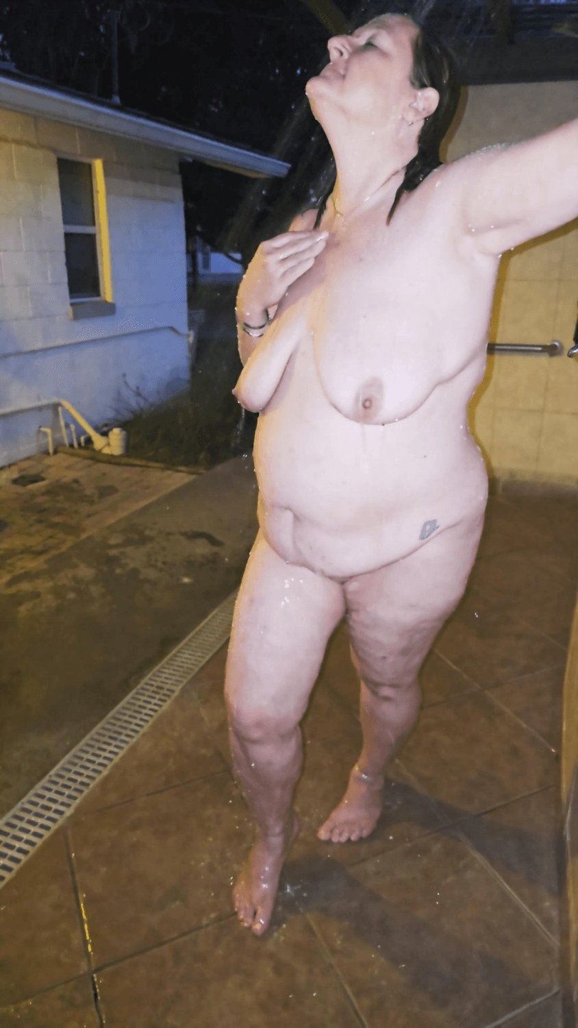 Beautiful mature old woman naked outdoors