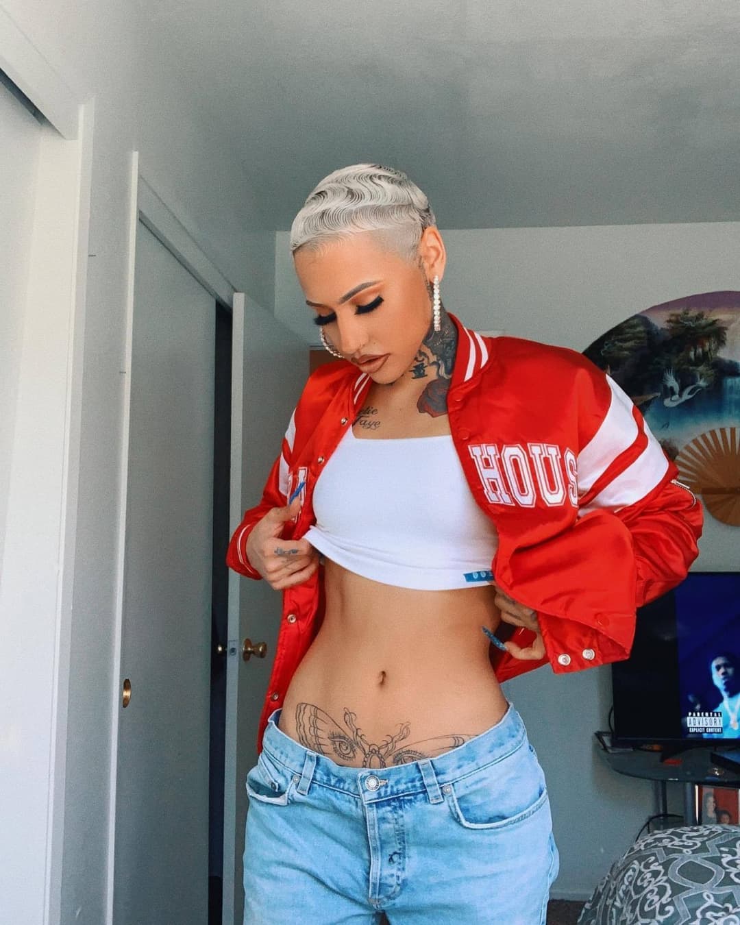 Light skin yellow bone short hair Tatted tomboy buzzcut Thotie rapper