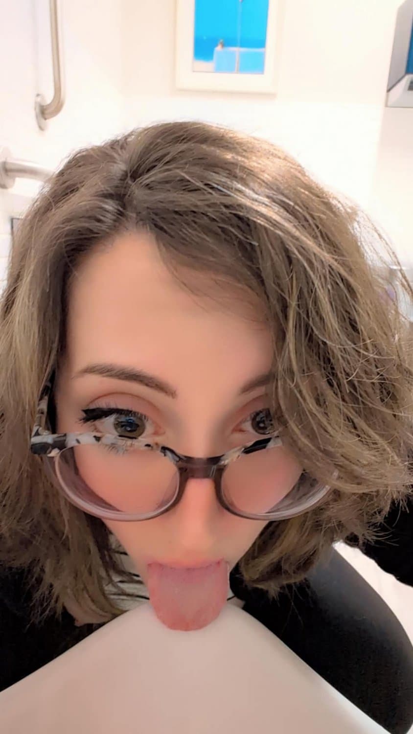 humiliated dumb slut licks urinal