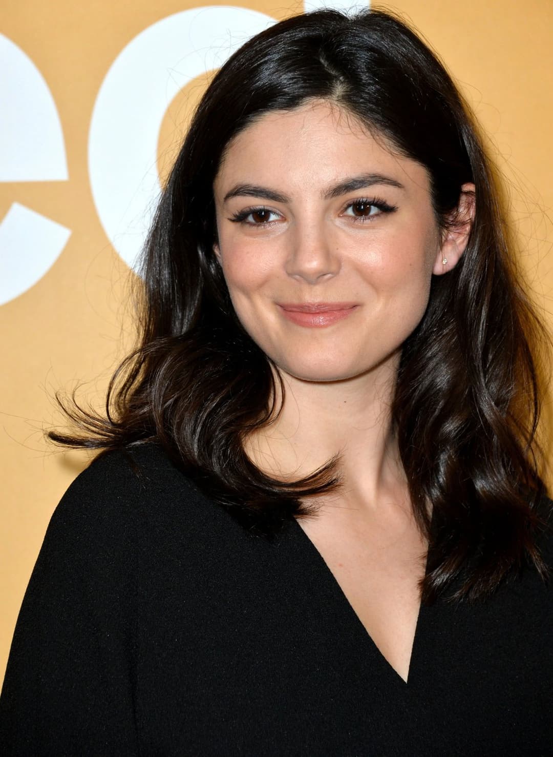 Dark Hair Dark Eyed sexy celeb Monica Barbaro.  Her slutty body is goonfuel