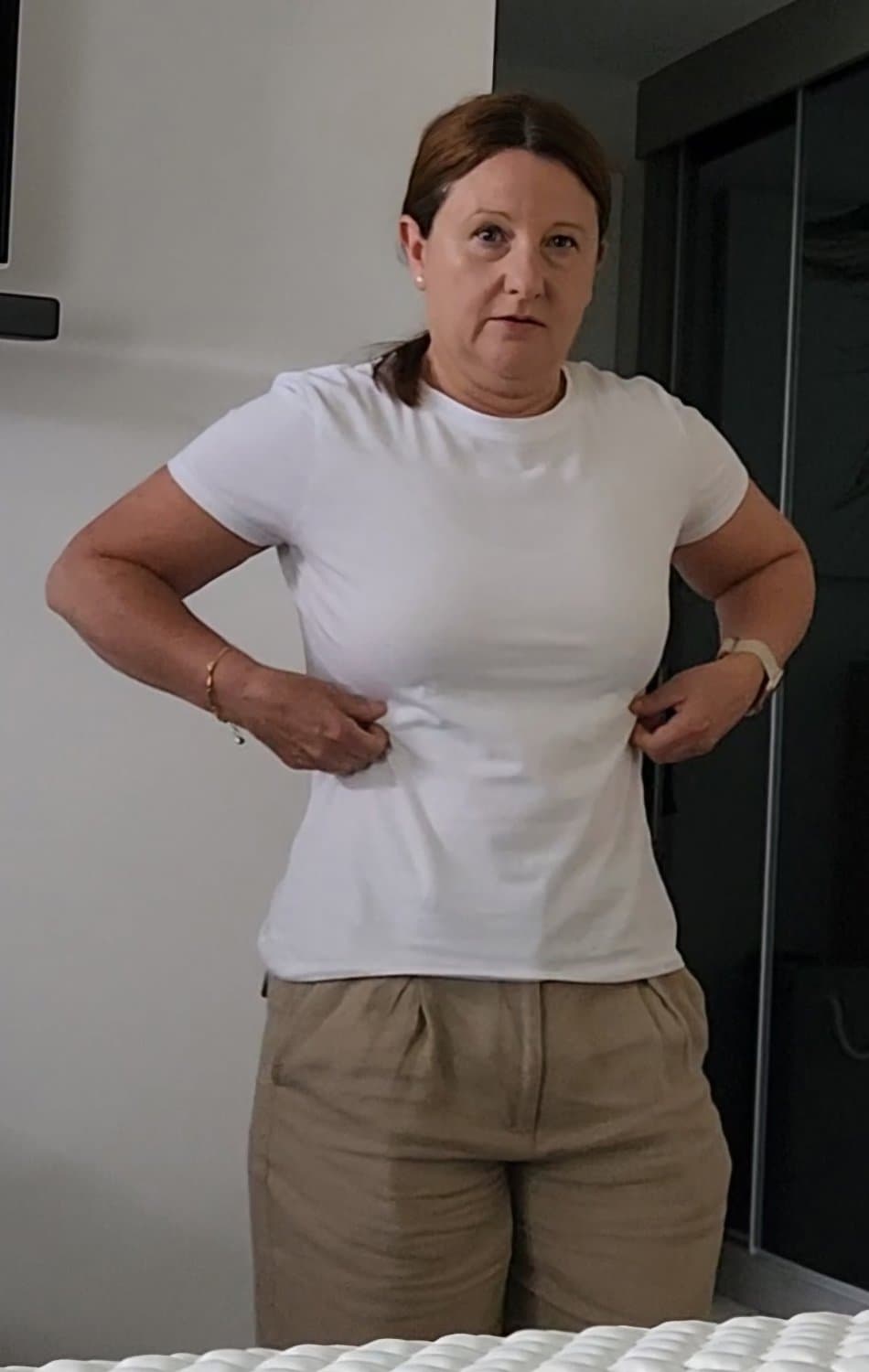 Pick an outfit to see this shy mature milf flashing her little tits. I will add it to the gallery.
