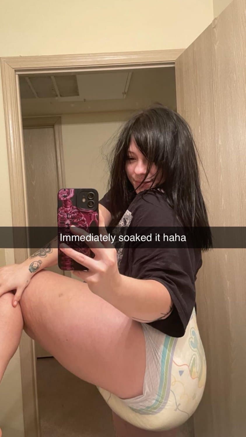 Shy college teen shows how full she makes her diapers