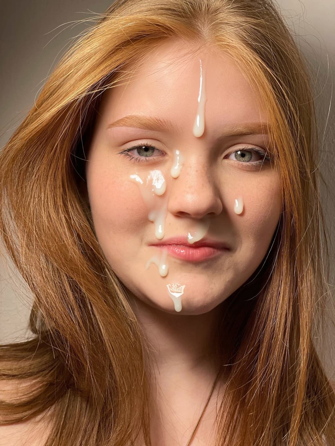 Cum on the face of a red-haired bitch