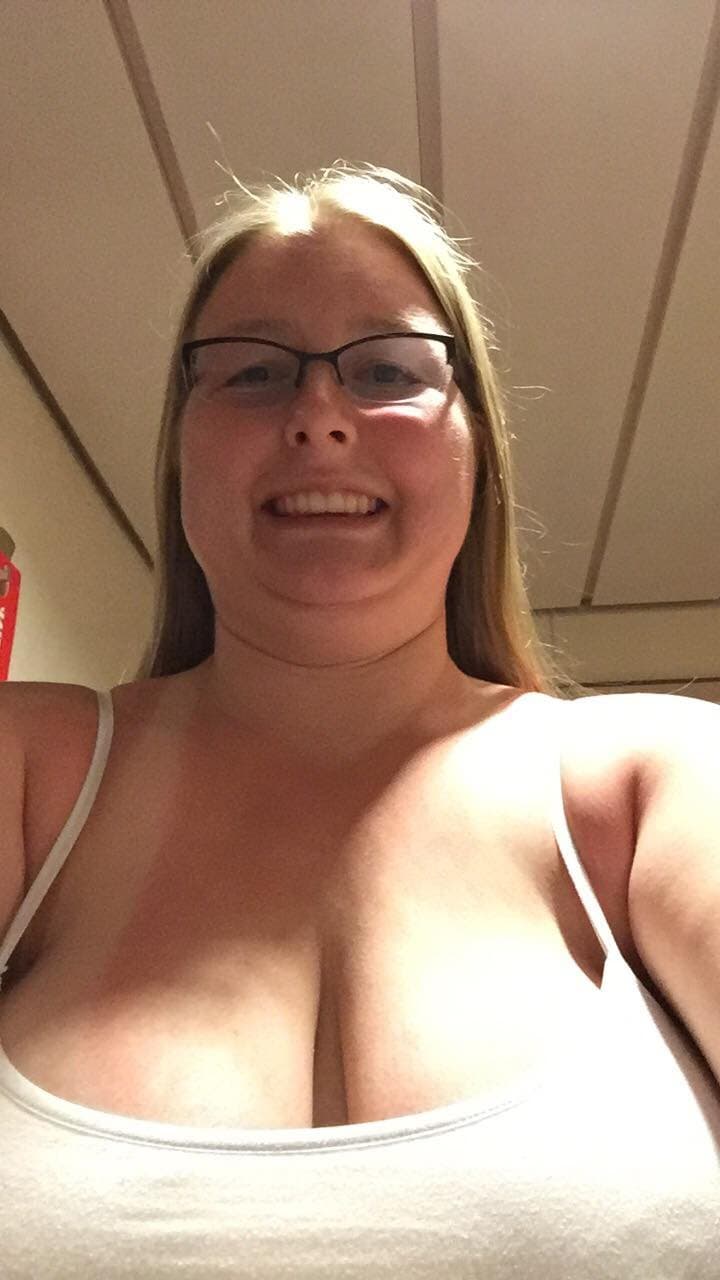 Blonde showing off her bare tits