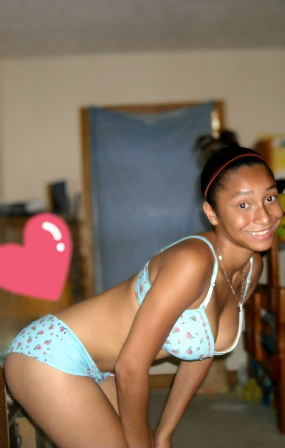 Teen Rican with a tight little body.