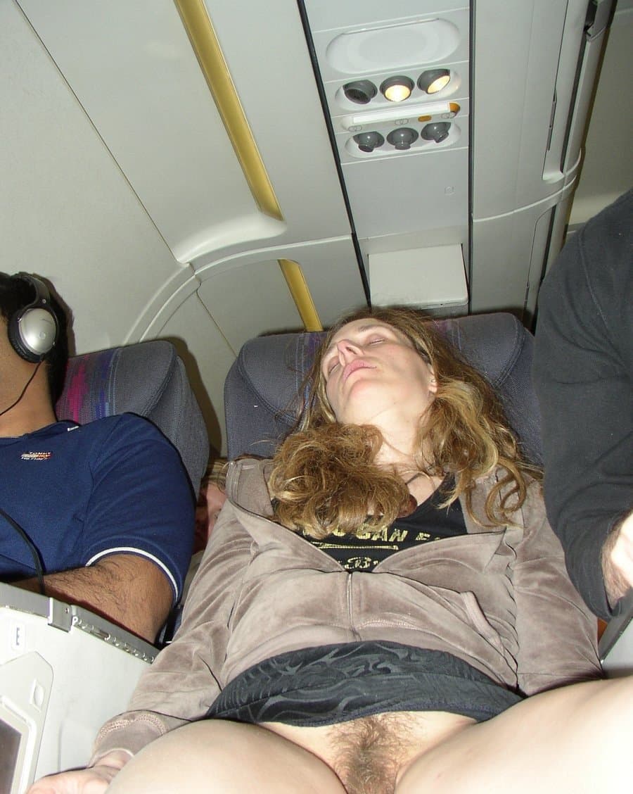 Hairy Pussy Wife shows off her bush during the flight