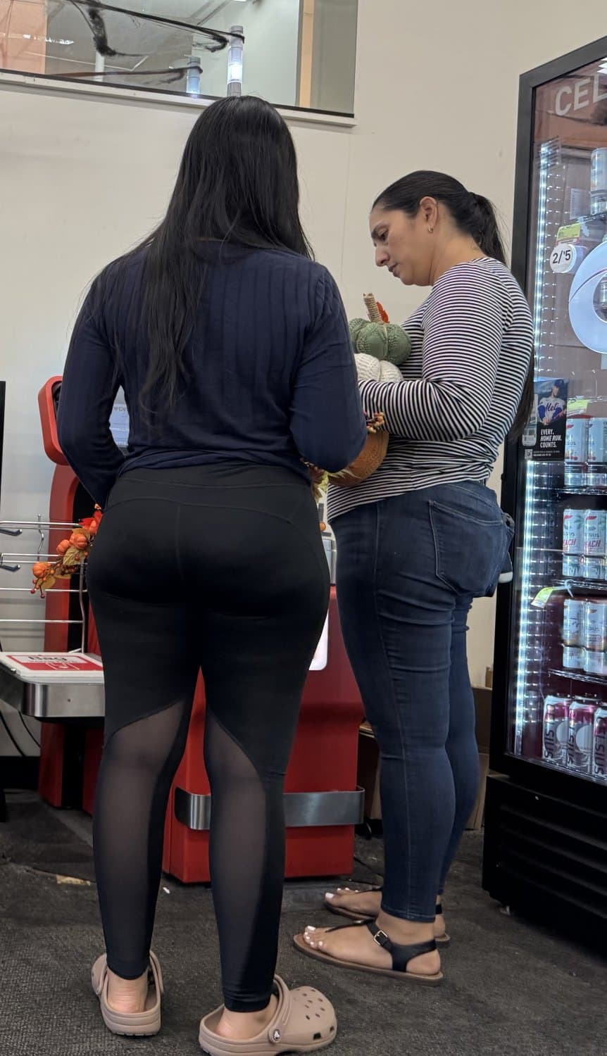 Mother in blue jeans  & Daughter in black tights.