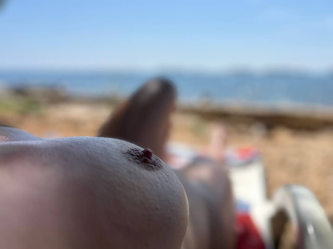 Nudist wife on beach showing again sexy tits & shaved pussy outdoor