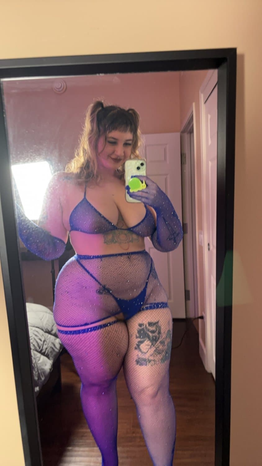 Looking real good in the blue fishnets and lingerie