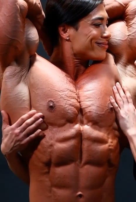 Wild lesbian orgy around her naked roided muscles